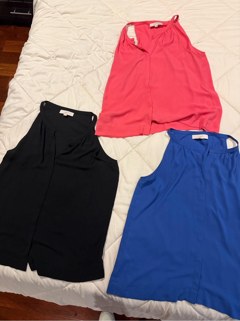 3 LOFT Sleeveless Blouse Trio in Black, Hot Pink, and Cobalt Blue All for $30